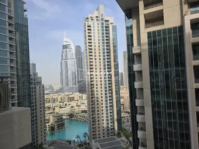 a view of a city skyline with tall buildings at Boulevard Charm- Studio Hideaway in Dubai