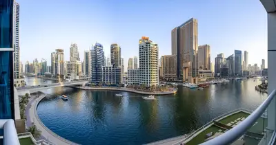 a view of a river in a city with buildings at ShoresInn -Waterfront Bliss in Dubai Marina in Dubai