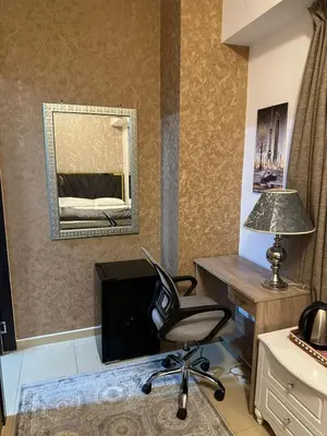 a room with a desk and a chair and a mirror at Private Room Steps from Jumeriah Beach & Marina Walk - LMY Sadaf 7 JBR Dubai in Dubai