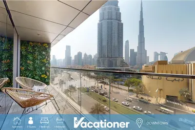 a view of a city from the balcony of a building at Vacationer I Luxury 2 Bedroom I Burj Khalifa View in Dubai