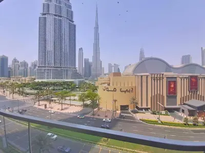 a view of a city with tall buildings and a street at Vacationer I Luxury 2 Bedroom I Burj Khalifa View in Dubai