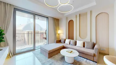 a living room with a couch and a table at Vacationer I Luxury 2 Bedroom I Burj Khalifa View in Dubai