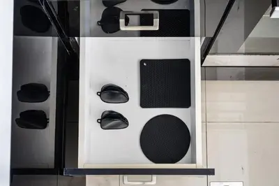 a room with shoes on a white shelf at Marina 2BR with 31st-Floor Ocean View in Dubai