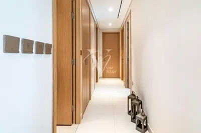 a corridor in a building with a hallway at 3BR in Vida Dubai Mall with Stunning Burj Khalifa View in Dubai