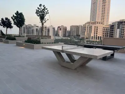 a stone bench sitting on top of a building at Luxury Stay - Dubai Creek Harbour - Branded Living - Burj View in Dubai