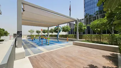 a playground with a slide in a building at Vogue Downtown Vida Dubai Mall, Direct Access to Dubai Mall via Climate Controlled bridge, Two Bedroom Apartment with Full Burj Khalifa View from Balcony and Access to all Amenities in Dubai