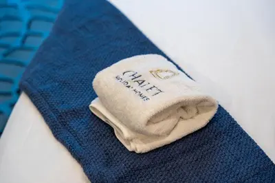 a close up of a sock on a mans tie at DAMAC Maison Cour Jardin in Dubai