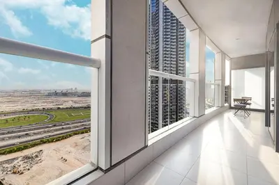 an apartment balcony with views of a city at Paramount Luxe Suite, Business Bay in Dubai