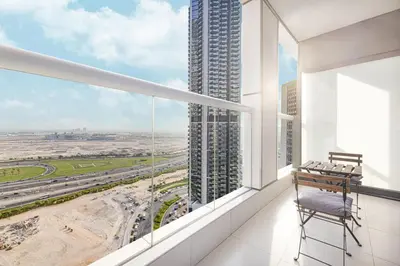 a balcony with a view of a city at Paramount Luxe Suite, Business Bay in Dubai