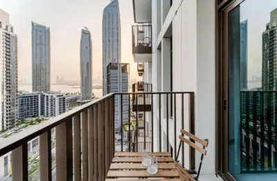 a balcony with a view of the city at Creek crescent in Dubai