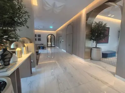 a hallway of a building with a hallwayngth at Luxury two beds apartment in Dubai