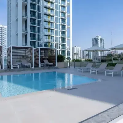 Warm Modern 2BR Retreat with Private Pool in JVC!