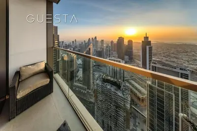 a balcony of a building with a view of the city at Grande Tower by Emaar, Downtown, Burj Khalifa in Dubai