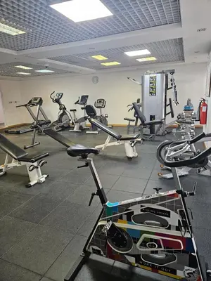 a gym with a bunch of exercise bikes in it at JLT Studio, Steps to Metro, High floor, Smart Home in Dubai