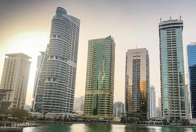 a group of tall buildings in a city at JLT Studio, Steps to Metro, High floor, Smart Home in Dubai