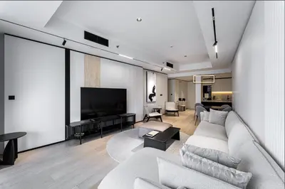 a living room with a couch and a flat screen tv at Opera Grand Sky Luxurious 3-Bedroom Apartment in Downtown Dubai with Panoramic Burj Khalifa View in Dubai