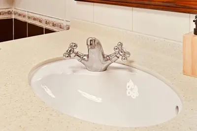 a bathroom sink with a silver faucet at Luxury Retreat Your High Floor Heaven in Marina in Dubai