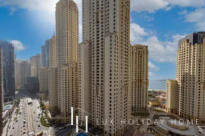 a view of a city with many tall buildings at LUX LIV Contemporary Marina View Suite 2 in Dubai