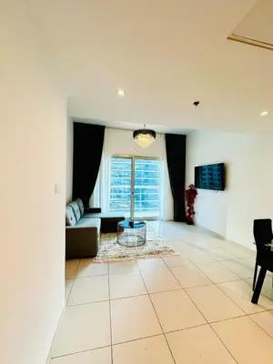 a living room with a couch and a table at Marina View Towers - Dubai Marina Walk Access - View - 1BHK - Marsa in Dubai