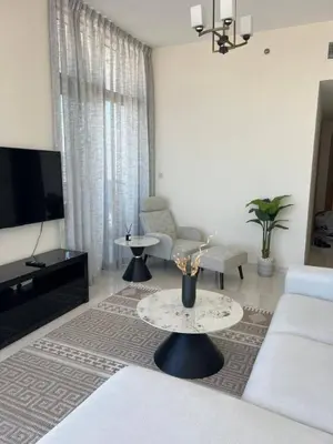 a living room with a couch and a table at 1BR Amazing Dubai And Sea View in Dubai