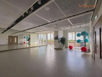 a large room with a dance floor with red and blue balls at Private Beach Access with Luxury Beachfront Lifestyle in Dubai