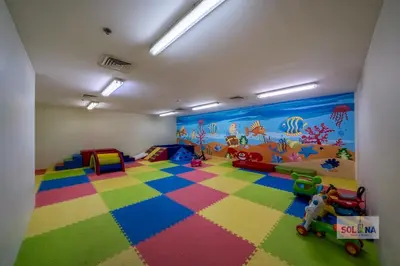 a room with a colorful floor with toys in it at Waterfront 1BR Apartment At Heart of Dubai Marina in Dubai