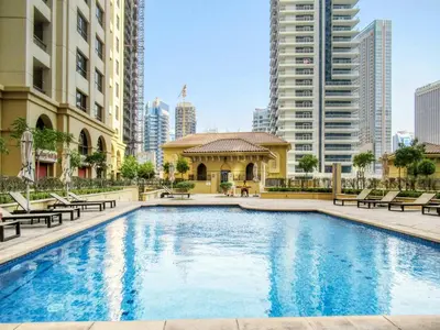 a swimming pool in a city with buildings at GYL Holiday Homes I Spacious 4 BDR Apt in JBR Beach, Dubai eye & Marina I Unbeatable location in Dubai