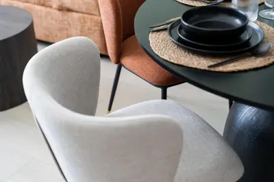 a table and chairs with hats on top of them at Meydan - Modern Family - 2BR Apartment - Azizi Riviera in Dubai