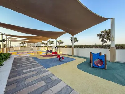a rendering of a playground with a canopy at Modern 1Bed near Parks and Famous Golf Clubs in Dubai