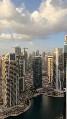 an aerial view of a city with tall buildings at Dar Al Noor Apartment in Dubai