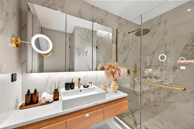 a bathroom with a sink and a mirror at Prestigious 2BD Seaside Apartment, The Address JBR in Dubai