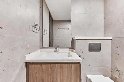 a bathroom with a sink and a mirror at Chic 1-Bedroom Retreat in Heart of Business Bay in Dubai