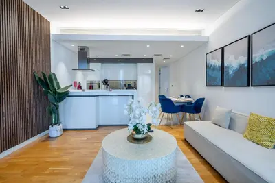 a living room with a couch and a table at TRPS - Bluewaters Residence 3, Bluewaters Island - Ain Dubai View, Fully Furnished, Close to JBR and Marina in Dubai