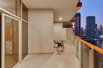 a balcony of a building with a view of a city at Millennium Heights 1 in Dubai