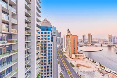 a view of a city skyline with tall buildings at Cityscape Comforts 2BR in Dubai