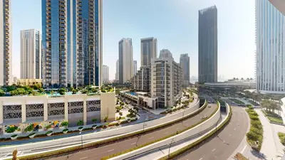 a highway in a city with tall buildings at Vacationer l Stunning 1 Bedroom l City View l Pool, Gym Access in Dubai
