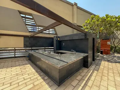 a building with a bath tub in a courtyard at Frank Porter - The Vogue, Business Bay in Dubai