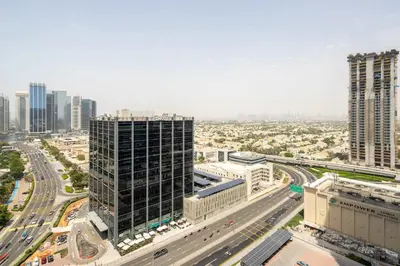 an aerial view of a city with a highway at Frank Porter - Dubai Arch Tower , JLT in Dubai