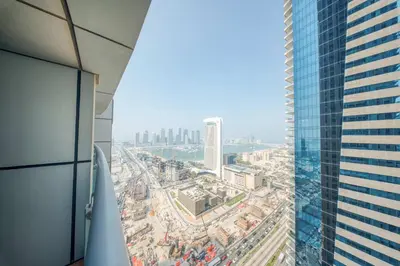 a view of a city from a skyscraper at PVH - Sea View 3BR and Maids Room - Princess Tower in Dubai