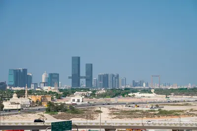 a view of a city with tall buildings at Modern 1BR I Canal View I Business Bay Dubai in Dubai