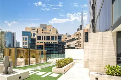a view of the city from the roof of a building at FIRST CLASS Studio Canal and Pool View in Dubai