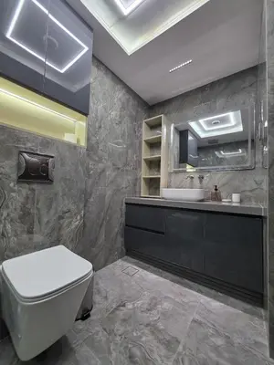 a bathroom with a toilet and a sink at Luxury Studio in JLT near Metro & Lake View in Dubai