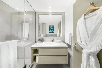 a bathroom with a sink and a shower at Iconic Burj Khalifa & Fountain Views near Dubai Mall in Dubai