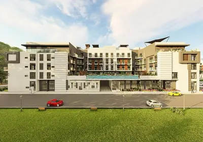 a large building with cars parked in front of it at Dubai heaven in Dubai