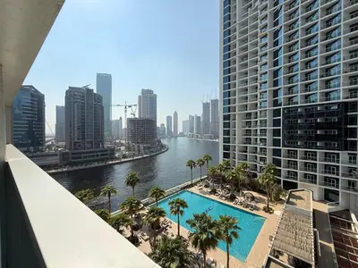 a view of a river from a building with a pool at Mahenti · Luxury Living at Its Finest in Dubai