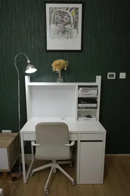 an office with a white desk and a chair at Stylish Marina Stay Near Bla Bla club & JBR Walk in Dubai