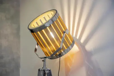 a yellow and silver lamp with a white curtain at Prime Dubai Marina Spot - Beach, Dining and leisure in Dubai