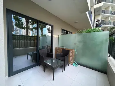 a patio with chairs and a table on a balcony at Zada Tower, Business Bay in Dubai