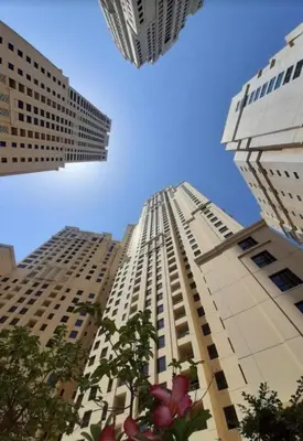 a view of two tall buildings in a city at JBR - spacious and neat 3br apt in Shams 1 in Dubai