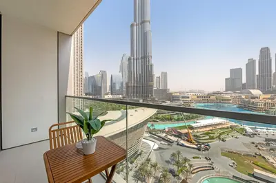 a balcony with a view of a city skyline at Glamarous 2BR Burj Khalifa & Fountain Views in Dubai